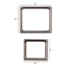 Load image into Gallery viewer, Tim Holtz - Idea-Ology - Metal Photo Frames - 4/Pkg. Add a touch of elegance to your creations with these Frames. These frames are crafted from brushed silver metal, providing a sleek and sophisticated look that is sure to elevate your projects. Available at Embellish Away located in Bowmanville Ontario Canada.