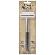 Load image into Gallery viewer, Tim Holtz - Idea-Ology - Texture Hammer. The Tim Holtz Tiny Texture Hammer small size makes it ideal for intricate tasks such as denting metal embellishments and hammering nails into craft projects with precision. Available at Embellish Away located in Bowmanville Ontario Canada.