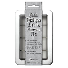 Cargar imagen en el visor de la galería, Tim Holtz - Mini Distress Ink Storage Tin - Holds 12. Ideal storage solution for mini distress ink pads! Organize and transport easily in a convenient clear windowed hinged tin. This package contains one 1x6.25x4.25 inch storage tin that will hold up to twelve mini inks. Imported. Available at Embellish Away in Bowmanville Ontario Canada..