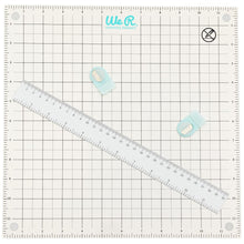 Charger l'image dans la galerie, We R Memory Keepers - All-In-One Magnetic Platform. The All-In-One Magnetic Platform is perfect for stenciling, aligning, embossing, and cutting. One side is an easy-clean work surface. Available at Embellish Away located in Bowmanville Ontario Canada.