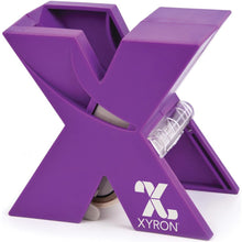 Load image into Gallery viewer, Xyron - 150 Create-A-Sticker Machine - 1.5"X20' Permanent - Assorted Colors. XYRON-Xyron 150. This little sticker making machine is perfect for scrapbooking, card making, school and scout projects. Drop your die-cuts, photos, ribbon and labels up to 1.5 inches wide and they will come out with adhesive evenly spread on one side. Available at Embellish Away located in Bowmanville Ontario Canada.