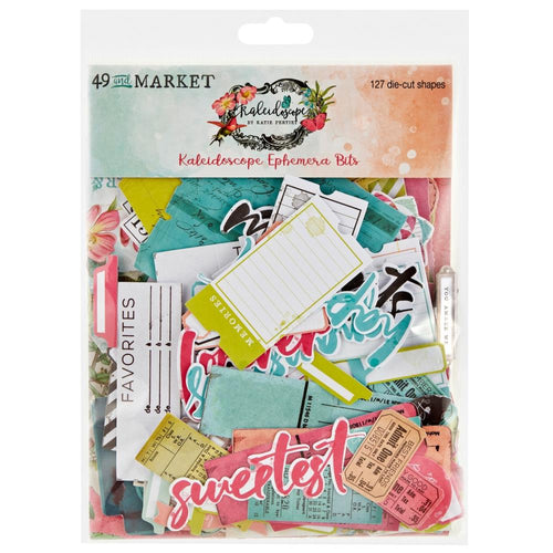 49 And Market - Ephemera Bits - Kaleidoscope. 127 pieces of ephemera in various sizes are included in this pack. This set is jammed pack with all sorts of die-cut pieces including frames, tabs, titles, pockets, labels, tags and journaling pieces. Available at Embellish Away located in Bowmanville Ontario Canada.