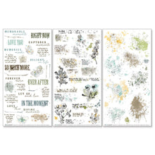 Cargar imagen en el visor de la galería, 49 And Market - Rub-On - Blendable - Krafty Garden. Elements from the Blendable rub-on transfer pack incorporate an artistic mix of watercolor, typography and elements to be used to create a dramatic pop of interest on any of your crafting projects. Available at Embellish Away located in Bowmanville Ontario Canada.
