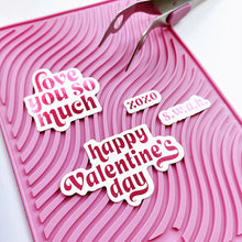 Load image into Gallery viewer, Catherine Pooler - Hot Foil Plates and Dies - Sweet Nothings. Add a foiled sentiment to your next Valentine project with the Sweet Nothings Hot Foil Plates. Featuring a large &quot;love you so much&quot; and &quot;happy Valentine&#39;s day&quot; , a small &quot;s.w.a.k&quot; and &quot;xoxo&quot;. Available at Embellish Away located in Bowmanville Ontario Canada. Example by brand ambassador.
