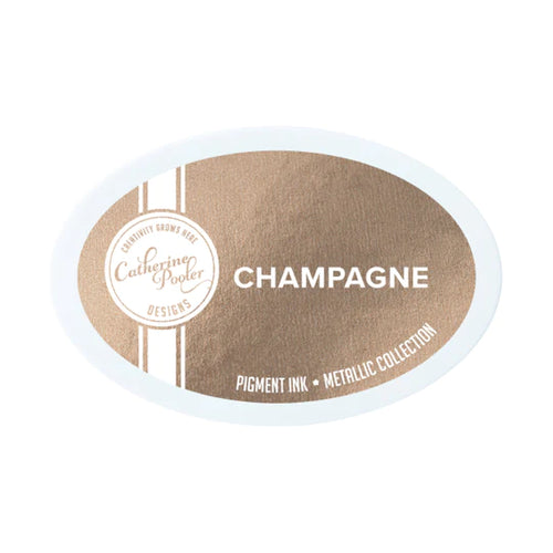 Catherine Pooler - Metallic Pigment Ink Pad - Champagne. The Champagne Metallic Pigment Ink is a gorgeous warm beige metallic. It’s perfect for any paper crafting project that calls for extra sparkle and shimmer. Available at Embellish Away located in Bowmanville Ontario Canada.