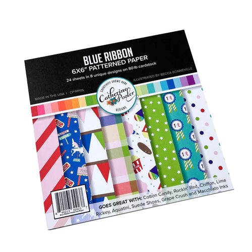 Catherine Pooler - Patterned Paper - Blue Ribbon. This pack of 6x6 paper features festive images from the fair like carousel horses and corn dogs and snow cones! Available at Embellish Away located in Bowmanville Ontario Canada.