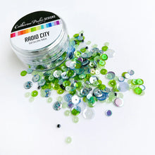 Cargar imagen en el visor de la galería, Catherine Pooler - Sequin Mix - Radio City. Approximately 1 Tablespoon mixture packaged in a clear screw top round container. Available at Embellish Away located in Bowmanville Ontario Canada.
