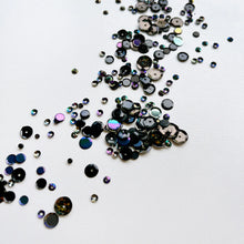 Cargar imagen en el visor de la galería, Catherine Pooler - Sequin Mix - Salem Sequin. When you need a class black sequin mix, grab this Salem Mix. Named for the Massachusetts town known for its eerie past, this mix brings the holographic sparkle and iridescent shine. Available at Embellish Away located in Bowmanville Ontario Canada.
