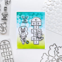 Load image into Gallery viewer, Catherine Pooler - Stamp &amp; Die Set - Recess. It&#39;s time for everybody&#39;s favorite subject-Recess! Grab the Recess Stamp Set and coordinating dies with all the essentials of nostalgic playground games like see-saw and hop scotch. Available at Embellish Away located in Bowmanville Ontario Canada. Example by brand ambassador.
