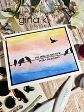 Cargar imagen en el visor de la galería, Gina K. Designs - Stamp - Serene Skies. Melanie Muenchinger has created some perfect silhouettes, powerlines and barbed wire fences to complement your blended ink backgrounds. This set is made of premium clear photopolymer and measures 6&quot; X 8&quot;. Available at Embellish Away located in Bowmanville Ontario Canada. Example by Melanie Muenchinger.
