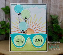 Load image into Gallery viewer, Gina K. Designs - Stamp &amp; Die Set - Sunny Days. Sunny Days are ahead with Melanie Muenchinger’s newest set, full of sunglasses, facial features, and round elements for stamping in the frames. Available at Embellish Away located in Bowmanville Ontario Canada. Example by brand ambassador.
