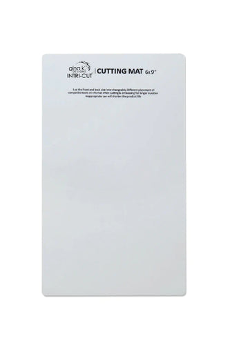 Gina K. Designs - Tools - Intri-cut Cutting Plate. Replacement Cutting Plate for the Intri-Cut Die Cutting Machine. Cutting plate size: 6 x 9. Available at Embellish Away located in Bowmanville Ontario Canada.