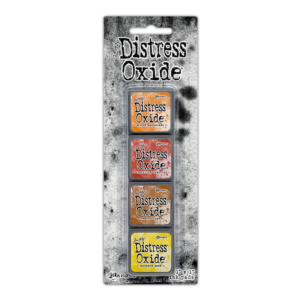 Ranger - Tim Holtz - Distress Mini Oxide Ink Pads Kit, #2 (4pc). Colours: Spiced Marmalade, Crackling Campfire, Rusty Hinge and Mustard Seed. Available at Embellish Away in Bowmanville Ontario Canada.