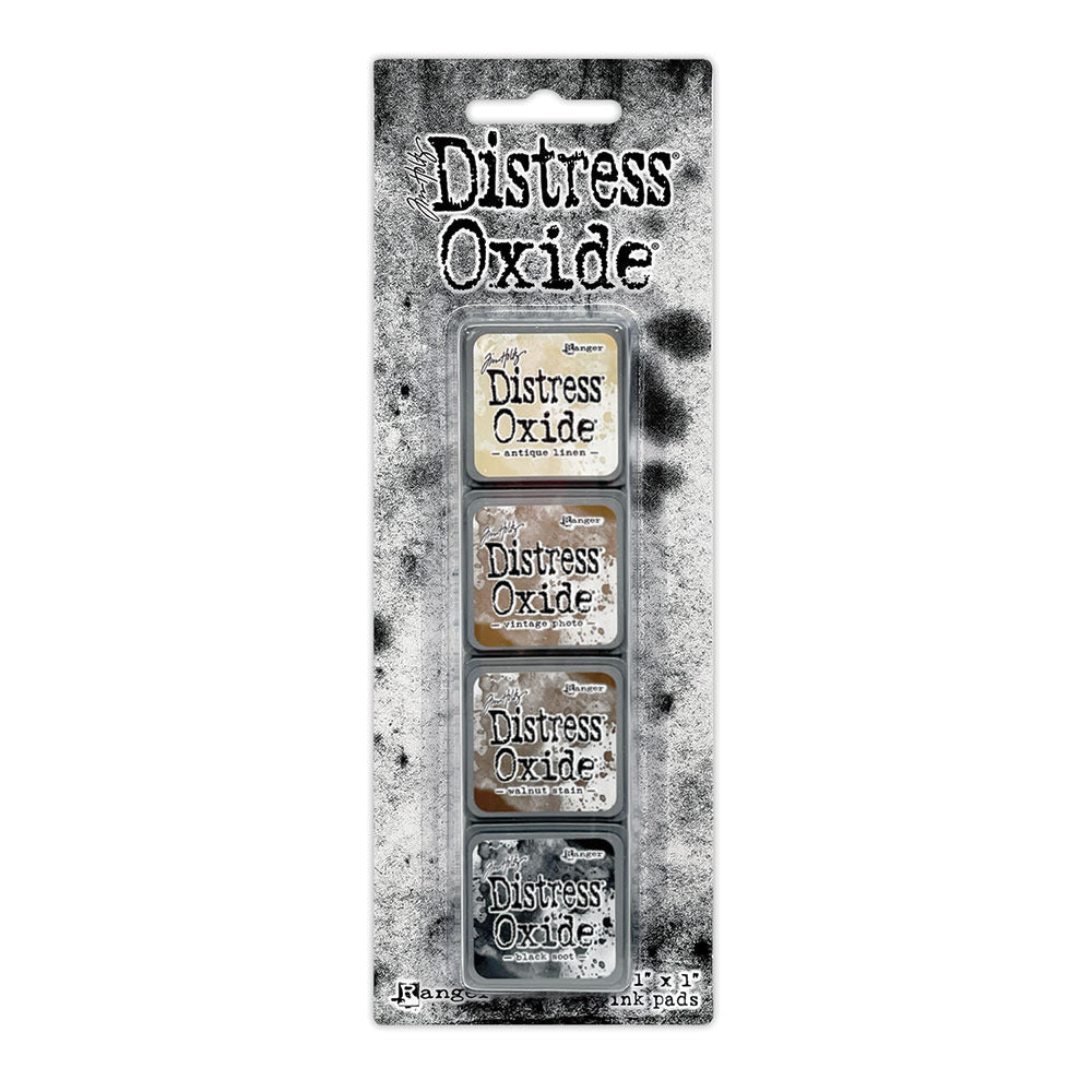Ranger - Tim Holtz - Distress Mini Oxide Ink Pads Kit, #6 (4pc). Colours: Antique Linen, Vintage Photo, Walnut Stain and Black Soot. Available at Embellish Away in Bowmanville Ontario Canada.