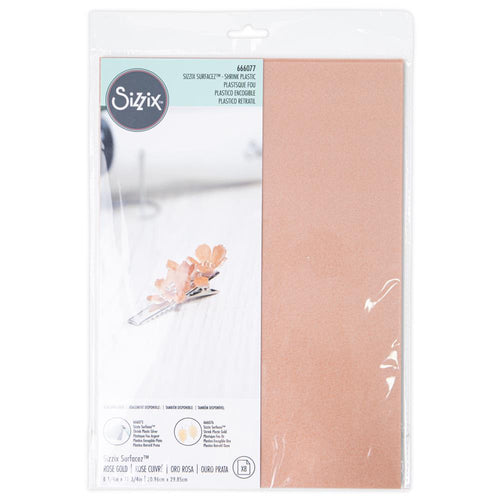 Sizzix - Surfacez Metallic Shrink Plastic - 8/Pkg - Rose Gold. Introducing Metallic Shrink Plastic - perfect for adding a touch of shimmer and shine to your projects. This versatile plastic sheeting is available in a range of metallic colors. Available at Embellish Away located in Bowmanville Ontario Canada.