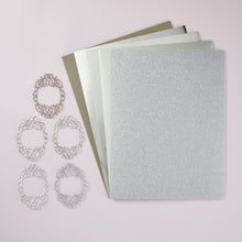 Load image into Gallery viewer, Spellbinders - Treasured Cardstock 8.5&quot;X11&quot; - 15/Pkg - Silver. 15 premium cardstock sheets includes 3 sheets each: glitter metallic (100 lb), matte metallic (85 lb), brushed metallic (85 lb), mirror metallic (85 lb), and pearl metallic (92 lb). Available at Embellish Away located in Bowmanville Ontario Canada.
