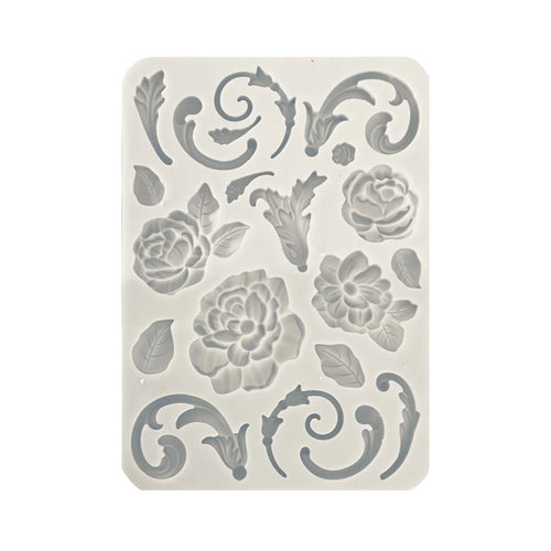 Stamperia - Silicone Mould A5 - Flowers And Embellishments. The base keeps the mold suspended and perfectly level, making it easy to use with liquid products like the crystal resin or liquid Gesso. Available at Embellish Away located in Bowmanville Ontario Canada.