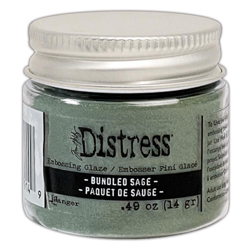 Tim Holtz - Distress Embossing Glaze - Bundled Sage. Add dimension to your projects with new embossing glaze! These translucent embossing powders are ideal for layering on surfaces. Available at Embellish Away located in Bowmanville Ontario Canada.