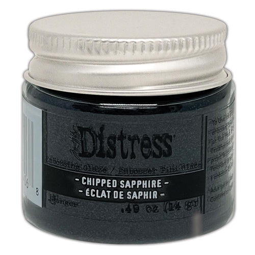 Tim Holtz - Distress Embossing Glaze - Chipped Sapphire. Add dimension to your projects with new embossing glaze! These translucent embossing powders are ideal for layering on surfaces. Available at Embellish Away located in Bowmanville Ontario Canada.