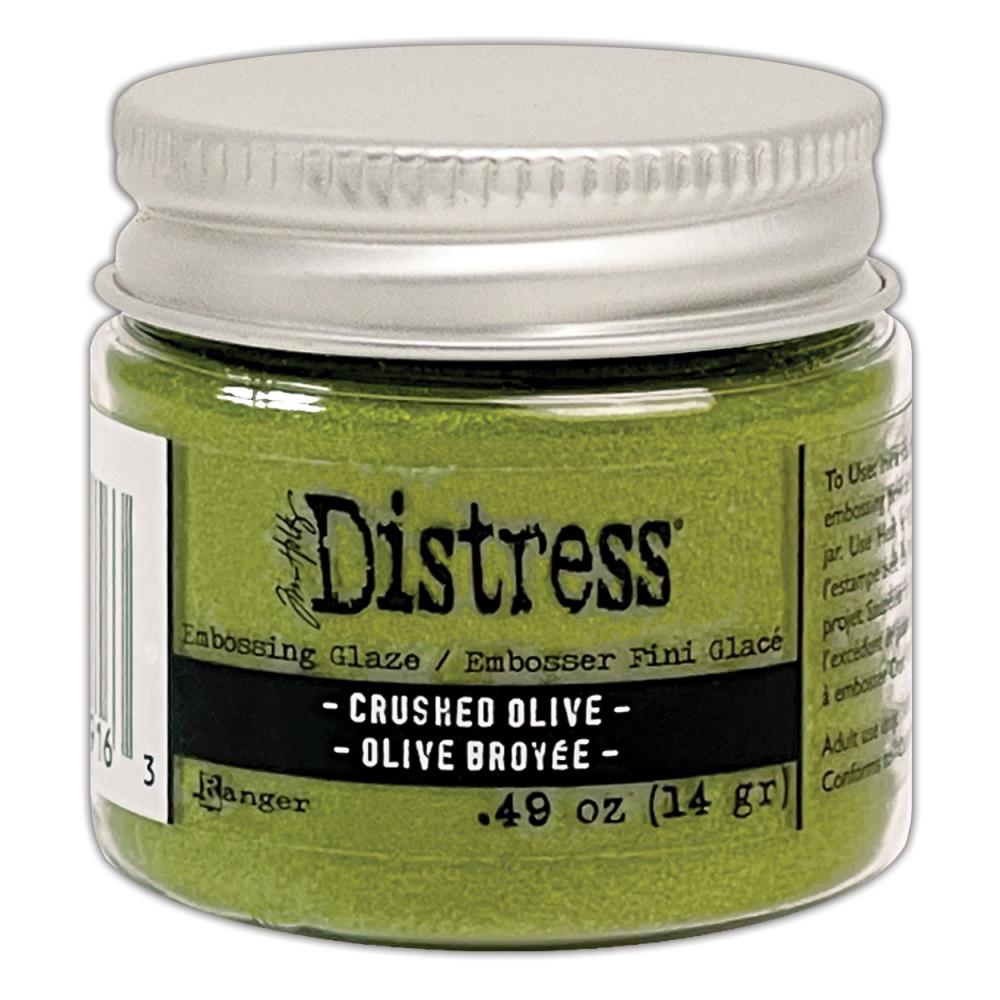 Tim Holtz - Distress Embossing Glaze - Crushed Olive. Add dimension to your projects with new embossing glaze! These translucent embossing powders are ideal for layering on surfaces. Available at Embellish Away located in Bowmanville Ontario Canada.