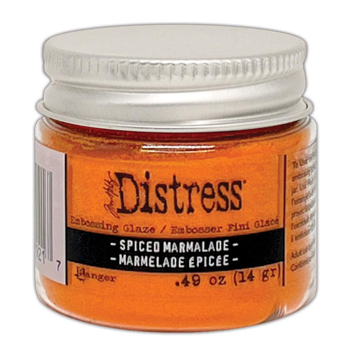 Tim Holtz - Distress Embossing Glaze - Spiced Marmalade. Add dimension to your projects with new embossing glaze! These translucent embossing powders are ideal for layering on surfaces. Available at Embellish Away located in Bowmanville Ontario Canada.