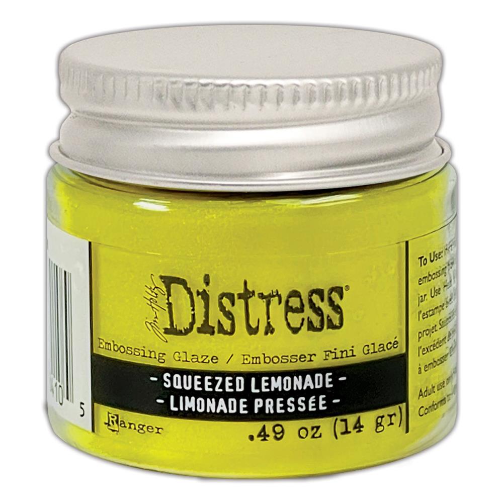 Tim Holtz - Distress Embossing Glaze - Squeezed Lemonade. Add dimension to your projects with new embossing glaze! These translucent embossing powders are ideal for layering on surfaces. Available at Embellish Away located in Bowmanville Ontario Canada.