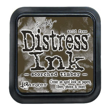 Load image into Gallery viewer, Tim Holtz - Distress Ink Pad - Large. Create an aged look on papers, fibers, photos and more! This package contains one 2-1/4x2-1/4 inch ink pad. Comes in a variety of distressed colors. Each sold separately. Scorched Timber. Available at Embellish Away located in Bowmanville Ontario Canada.
