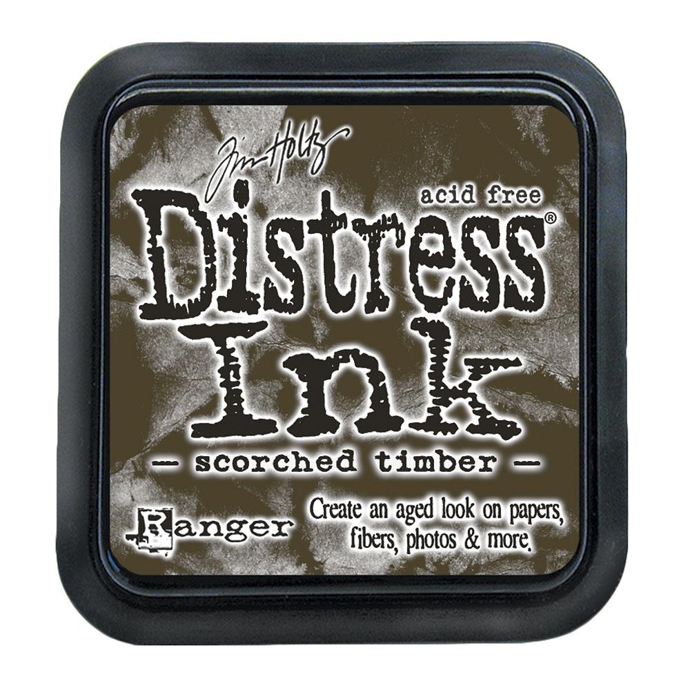 Tim Holtz - Distress Ink Pad - Large. Create an aged look on papers, fibers, photos and more! This package contains one 2-1/4x2-1/4 inch ink pad. Comes in a variety of distressed colors. Each sold separately. Scorched Timber. Available at Embellish Away located in Bowmanville Ontario Canada.