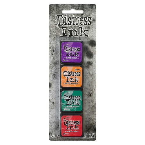 Ranger - Tim Holtz Distress Mini Ink Pads 4/Pkg - Kit #15. this package includes the colours: Wilted Violet,, Carved Pumpkin, Lucky Clover, Candied Apple. Available at Embellish Away located in Bowmanville Ontario Canada.