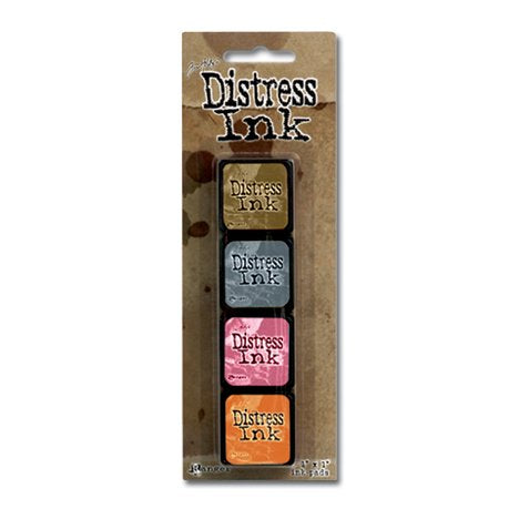 Ranger - Tim Holtz Distress Mini Ink Pads 4/Pkg - Kit #7. this package includes the colours: Old Paper, Weathered Wood, Worn Lipstick and Wild Honey. Available at Embellish Away located in Bowmanville Ontario Canada.