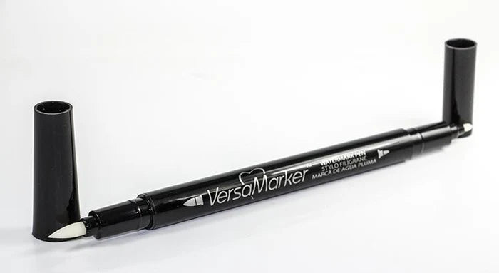 Tsukineko - Versamark - Watermark Pen. Tsukineko's versamarker pen has a brush tip on one end and a smaller rounded bullet tip on the other end. Available at Embellish Away located in Bowmanville Ontario Canada.