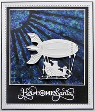 Load image into Gallery viewer, Creative Expressions - Festive Industrial Chic Collection - Here Comes Santa. Add some steampunk flair to your Christmas project this year with the Industrial Chic Here Comes Santa die. Designed by Sue Wilson. The Industrial Chic collection is an elegant collection of high quality steel dies designed to co-ordinate with each other. Includes 1 die. Size: 4 x 1.1 in. Available at Embellish Away located in Bowmanville Ontario Canada. Card example by Brand Ambassador.
