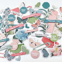 Cargar imagen en el visor de la galería, 49 And Market - Chipboard Set - Vintage Artistry Tranquility. 62 pieces of thin non-adhesive backed chipboard shapes. This set includes tags, banners, labels, circle shapes, butterflies and more. These pieces can be added to all your crafting projects. Available at Embellish Away located in Bowmanville Ontario Canada.
