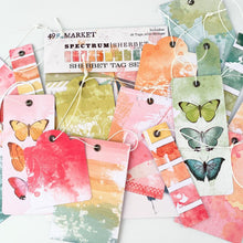 Load image into Gallery viewer, 49 And Market - Spectrum Sherbert - Tag Set. Includes 18 tags with metal eyelets and strings attached. Images include tags with watercolor splashes, florals, and butterflies. Coordinates with all other pieces from the Spectrum Sherbet collection. Imported. Available at Embellish Away located in Bowmanville Ontario Canada.
