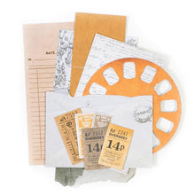 Load image into Gallery viewer, 49 and Market - Vintage Artistry In Mango - Ephemera Stack. Includes 37 mix and match pieces of heavy weight cardstock die-cuts. Pieces vary in size. Stack, layer or use alone. Imported.  Coordinating Options: Collection Pack 12X12, Collection Pack 6X6, Bubbles &amp; Baubles, Rub-Ons. Available at Embellish Away located in Bowmanville Ontario Canada.
