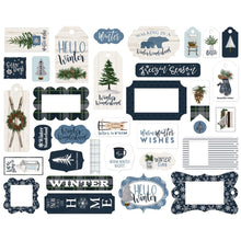 Load image into Gallery viewer, Carta Bella - Cardstock Ephemera 33/Pkg - Frames &amp; Tags - Welcome Winter. Coordinating: Kit 12X12, Pad 6X6, Solid Cardstock 12&quot;X12&quot;, Ephemera - Frames &amp; Tags, Ephemera - Icons, Enamel Dots, Puffy Stickers, Chipboard 6X13 - Accents, Chipboard 6X13 - Phrases, Chipboard 6X13 - Frames, Decorative Brads. Available at Embellish Away located in Bowmanville Ontario Canada.
