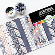 गैलरी व्यूवर में इमेज लोड करें, Catherine Pooler - 6x6 Patterned Paper - Twilight Reading. The Twilight Reading Patterned Paper is all about tone-on-tone Twilight &amp; Black Jack grays with a soft pop of Apricot.  This pack has a botanical library theme and features a number of floral prints and elegant patterns. Available at Embellish Away located in Bowmanville Ontario Canada.
