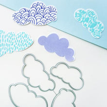 Load image into Gallery viewer, Catherine Pooler - Die Set - April Showers. Use the four (4) dies in the April Showers Dies set to cut out the clouds from the April Showers Stamp Set for lots of pattern play. Illustrated by Elizabeth Silver.  Available at Embellish Away located in Bowmanville Ontario Canada.
