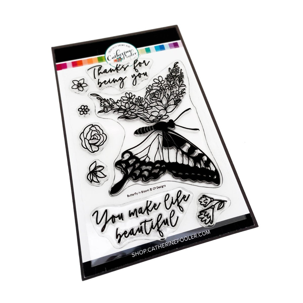 Catherine Pooler - Stamp Set - Butterfly In Bloom. Full of surreal beauty is the Butterfly in Bloom Stamp Set and Dies. This work of art is part butterfly, part flower garden. This large image stamp is a real statement piece for a card and features elegant sentiments like 