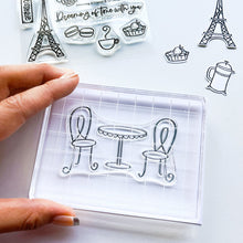 गैलरी व्यूवर में इमेज लोड करें, Catherine Pooler - Stamp Set - Dreaming of France. Meet me in Paris, mon cherie! The Dreaming of France Stamp Set will transport you to a French cafe. This stamp set&#39;s wispy images feature French confections, coffee, the iconic Eiffel Tower and even a neighborhood kitty. Available at Embellish Away located in Bowmanville Ontario Canada.
