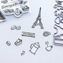 Load image into Gallery viewer, Catherine Pooler - Stamp Set - Dreaming of France. Meet me in Paris, mon cherie! The Dreaming of France Stamp Set will transport you to a French cafe. This stamp set&#39;s wispy images feature French confections, coffee, the iconic Eiffel Tower and even a neighborhood kitty. Available at Embellish Away located in Bowmanville Ontario Canada.
