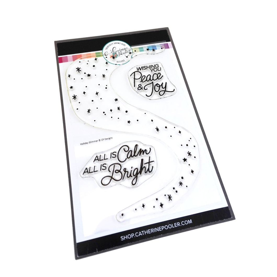 Catherine Pooler - Stamp Set - Holiday Glimmer. Add a burst of sparkle to your holiday cards with the Holiday Glimmer Stamp Set. This large starburst patterned stamp is paired with two classic, hand-lettered sentiments- 