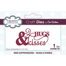 Cargar imagen en el visor de la galería, Creative Expressions - Sue Wilson Mini Expressions - Craft Die - Hugs &amp; Kisses. This single die is a useful and thoughtful greeting, the text is a mixture of capitals and a very elegant script that will really pop on cards and even scrapbook pages. Size: 2.4 x 1.2 in. Available at Embellish Away located in Bowmanville Ontario Canada.
