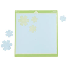 Load image into Gallery viewer, Cricut - Cutting Mats 12&quot;X12&quot; - 2/Pkg - StandardGrip. This multi-purpose mat is perfect for a wide range of medium weight materials: patterned paper, vinyl, iron-on and cardstock. This package contains two 12x12 inch standard grip cutting mat. Imported. Available at Embellish Away located in Bowmanville Ontario Canada.
