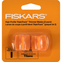 Load image into Gallery viewer, FISKARS-Titanium Triple Track Replacement Trimmer Blade Cartridges. These blade cartridges are for use in Fiskars Triple Track paper trimmers (not included). This package contains two blade cartridges. Caution: blade is extremely sharp. Handle with care. Imported. Available at Embellish Away located in Bowmanville Ontario Canada.
