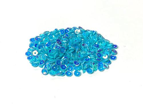 Gina K. Designs - Embellishment - Sparkling Sea Sequins. Add some bling, sparkle and shine to your craft projects with these beautiful 4 mm sequins.  A perfect embellishment for the front of hand crafted cards, scrapbook pages and more.  Use as shaker bits in your next shaker card. FEATURES Resealable package contains approximately one tablespoon of 4 mm sequins. Available at Embellish Away located in Bowmanville Ontario Canada.