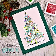 Load image into Gallery viewer, Gina K. Designs - Stamps - Christmas Silhouettes. Christmas Silhouettes stamp set is made of premium clear photopolymer and measures 6&quot; X 8&quot;.  Made in the USA.  *Originally Included with the Warm Winter Wishes kit*  Matching dies sold separately. Available at Embellish Away located in Bowmanville Ontario Canada. Card design by Rema DeLeeuw.
