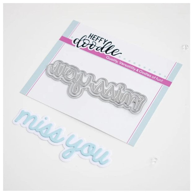 Heffy Doodle - Heffy Cuts Die - Miss You. A metal cutting die of the words 'Miss You’ in a script font style, in addition to a matching outline die to create a shadow matt layer. Use together or separately to create different looks for your projects. Measuring approximately 3.5