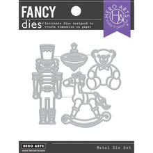 Load image into Gallery viewer, Hero Arts - Fancy Dies - Vintage Toys. Set of four charming vintage toy dies, this set is perfect for cardmaking, gift tags or toppers, holiday crafting or mixed media projects. Nutcracker measures approximately 1.2x3.3 inches, spinning top 1.1x1.1 inches. Hero Arts Fancy Dies are stand-alone designs that produce beautifully detailed cut-outs on paper. Available at Embellish Away located in Bowmanville Ontario Canada.
