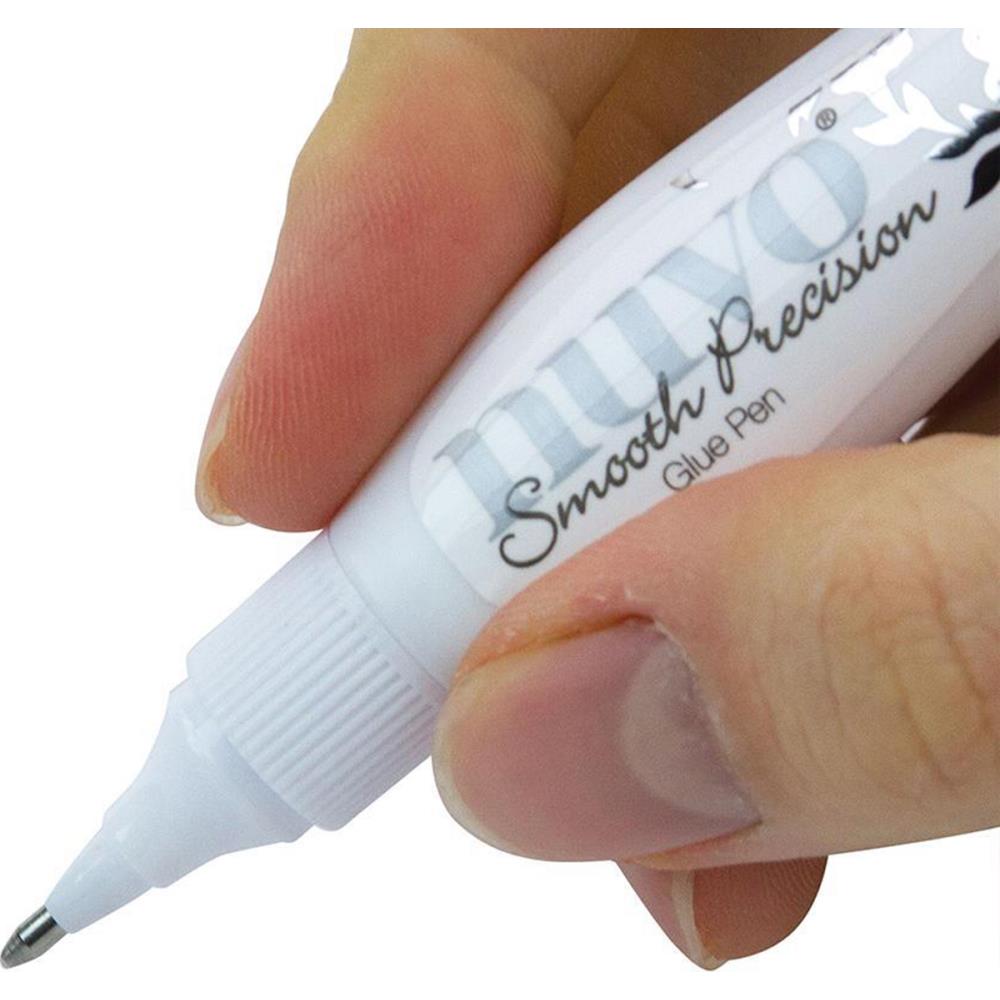 Smooth Precision Glue Pen - Effortlessly drifts across projects with a strong and reliable adhesive. The easy-to-control, squeezable barrel produces thick or thin lines which dry clear for a cleaner finish. Available at Embellish Away located in Bowmanville Ontario Canada.
